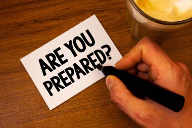 Conceptual hand writing showing Are You Prepared Question. Business photo text Ready Preparedness Readiness Assessment Evaluation Text white paper hand black marker coffee glass letter clipart