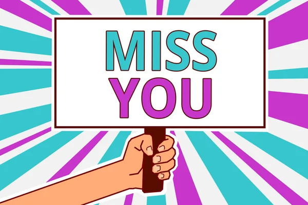 Conceptual hand writing showing Miss You. Business photo showcasing Longing for an important person in your life for a period of time Man hold board idea reflection intention strike background