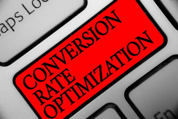 Writing note showing Conversion Rate Optimization. Business photo showcasing system for increasing percentage of visitors Keyboard red key Intention computer computing reflection document