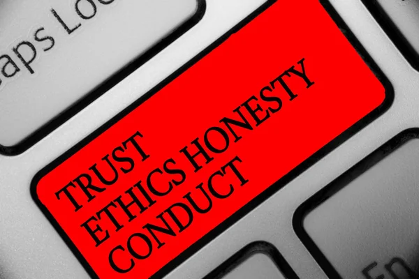 Writing note showing Trust Ethics Honesty Conduct. Business photo showcasing connotes positive and virtuous attributes Keyboard red key Intention computer computing reflection document