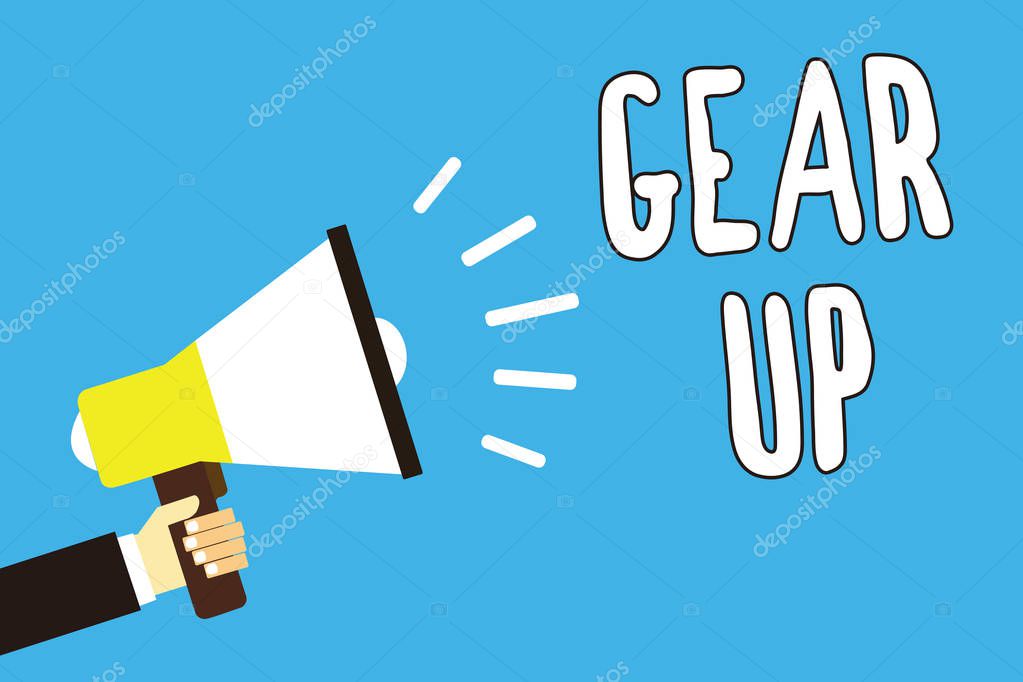 Conceptual hand writing showing Gear Up. Business photo text Asking someone to put his clothes or suit on Getting ready fast Man holding megaphone loudspeaker blue background speaking loud