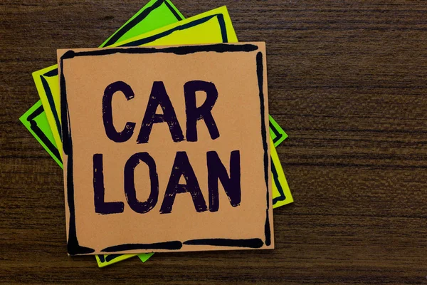 Word writing text Car Loan. Business concept for taking money from bank with big interest to buy new vehicle Paper notes Important reminders Express ideas messages Wooden background