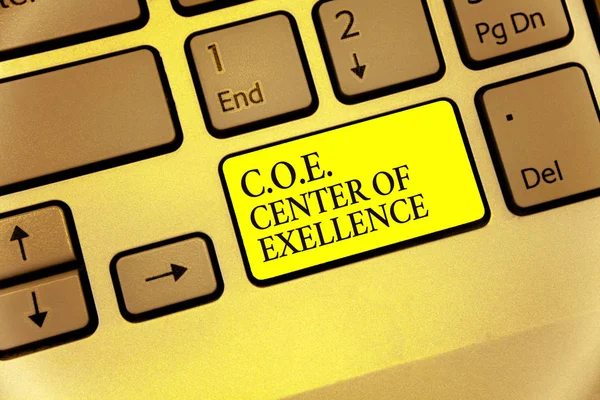 Conceptual hand writing showing C.O.E Center Of Excellence. Business photo showcasing being alpha leader in your position Achieve Keyboard yellow key Intention computing reflection document