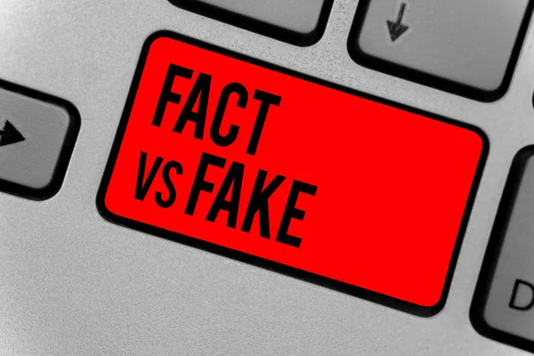 Text sign showing Fact Vs Fake. Conceptual photo Rivalry or products or information originaly made or imitation Keyboard red key Intention create computer computing reflection document