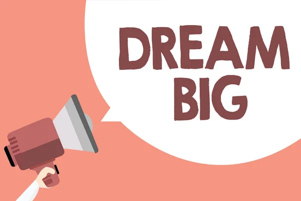 Handwriting text Dream Big. Concept meaning To think of something high value that you want to achieve Megaphone loudspeaker loud screaming scream idea talk talking speech bubble