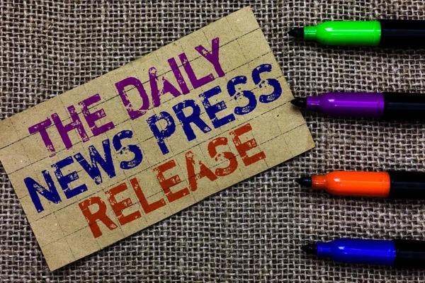 Handwriting text writing The Daily News Press Release. Concept meaning announcing big news or speak to people Paperboard computer mouse jute background Expressing ideas typing needs