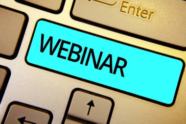 Kavramsal el Webinar gösterilen yazma. Internet Web konferans klavye mavi anahtar niyeti bilgi işlem yansıma belge üzerinde yapılan seminer olarak tanımlanan iş fotoğraf vitrine