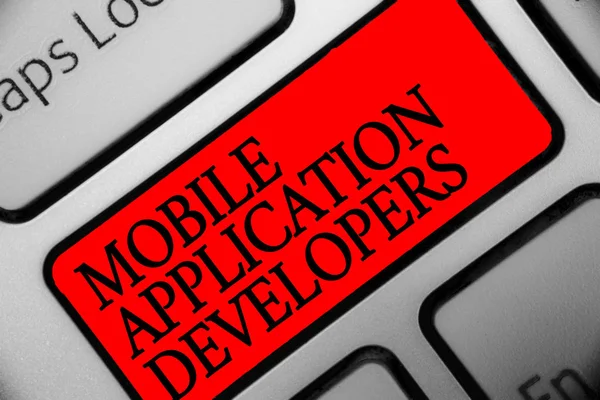 Writing note showing Mobile Application Developers. Business photo showcasing create software for devices like Android Keyboard red key Intention computer computing reflection document