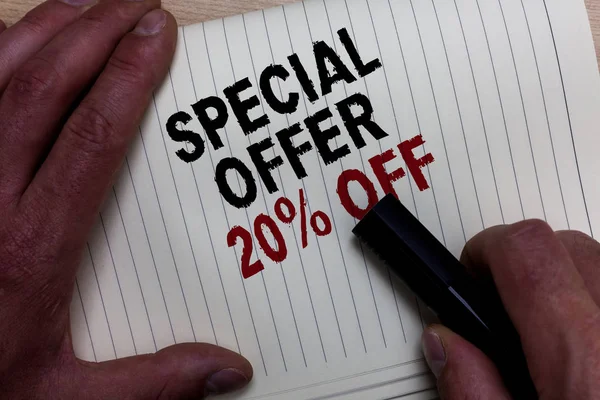 Word writing text Special Offer 20 Off. Business concept for Discounts promotion Sales Retail Marketing Offer Man's hand grasp black marker with some black and red texts on white page