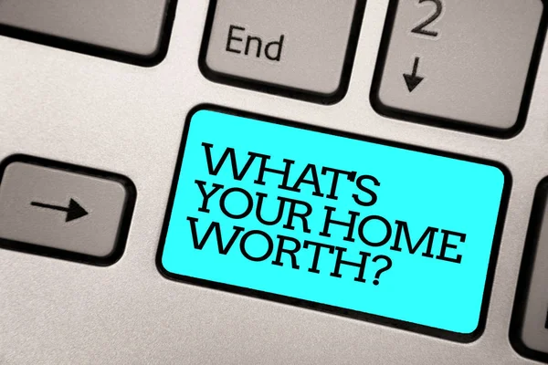 Text sign showing What s is Your Home Worth question. Conceptual photo Value of a house Property Cost Price Rate Silver grey computer keyboard with blue button black color written text
