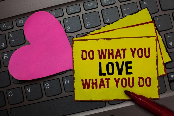 Writing note showing Do What You Love What You Do. Business photo showcasing Make things that motivate yourself Passion Red bordered yellow written paper pinch with love on computer keybaord