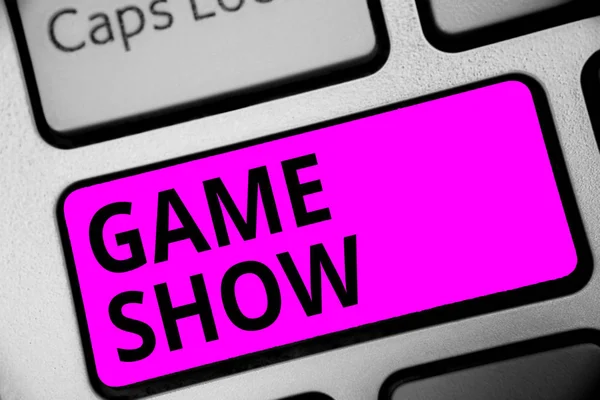 Writing note showing Game Show. Business photo showcasing Program in television or radio with players that win prizes Keyboard purple key Intention computer computing reflection document