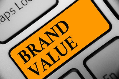 Marka değeri gösterilen Not yazma. Portakal anahtar niyeti bilgisayar bilgi işlem yansıma belge adlarının klavye için şirket vitrine iş fotoğraf ürün ile tanınabilir oluşturur