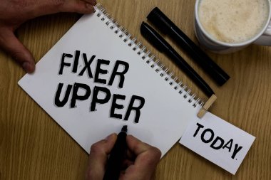 Writing note showing Fixer Upper. Business photo showcasing house in need of repairs used chiefly connection with purchase Man holding marker notebook clothepin reminder wooden table cup coffee clipart