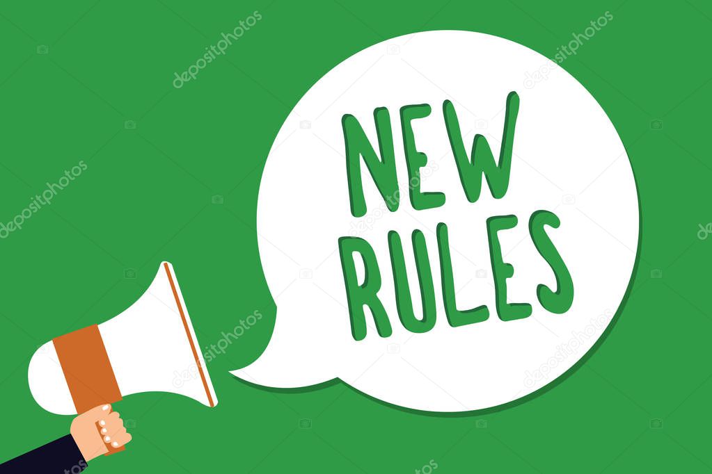 Conceptual hand writing showing New Rules. Business photo showcasing A state of changing an iplemented policy for better upgrade Man holding megaphone loudspeaker screaming green background