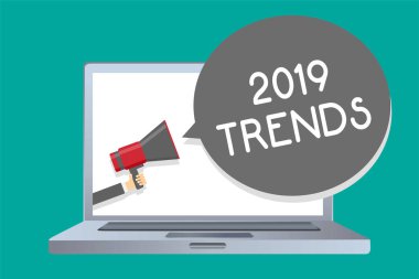 Kavramsal el 2019 Trendler gösterilen yazma. Geçerli yıl adam kısa süre için ünlüdür şeyler vitrine iş fotoğraf megafon hoparlör konuşma balonu mesajı yüksek sesle holding