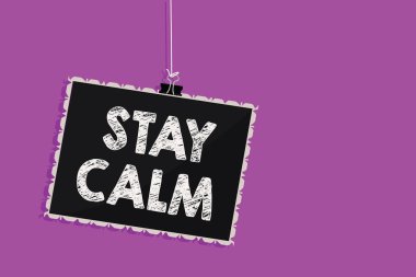 Text sign showing Stay Calm. Conceptual photo Maintain in a state of motion smoothly even under pressure Hanging blackboard message communication information sign purple background clipart