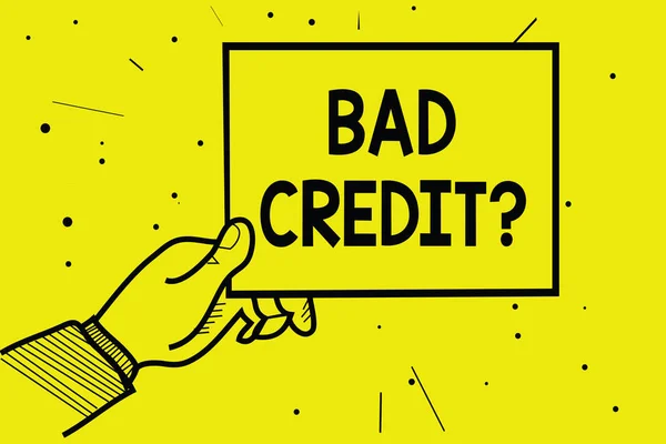 Word writing text Bad Credit question. Business concept for history when it indicates that borrower has high risk Man hand holding paper communicating information dotted yellow background