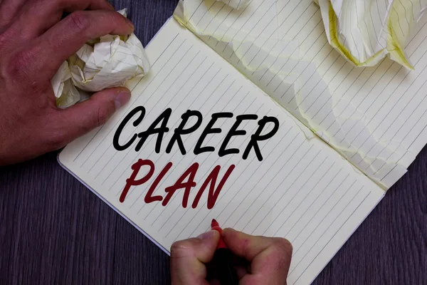 Word writing text Career Plan. Business concept for ongoing process where you Explore your interests and abilities Man holding marker notebook crumpled papers ripped pages mistakes made
