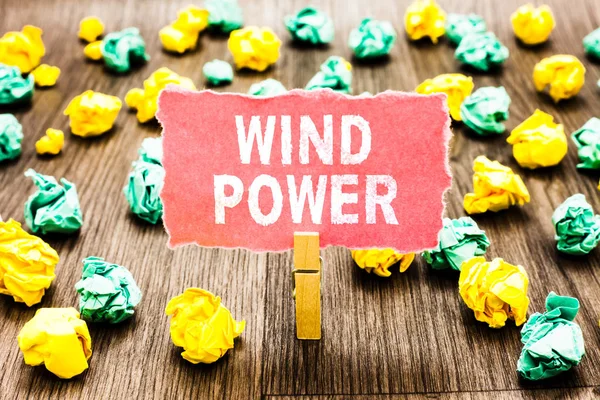 Word writing text Wind Power. Business concept for use of air flowto provide mechanical power to turn generators Clothespin holding pink note paper crumpled papers several tries mistakes