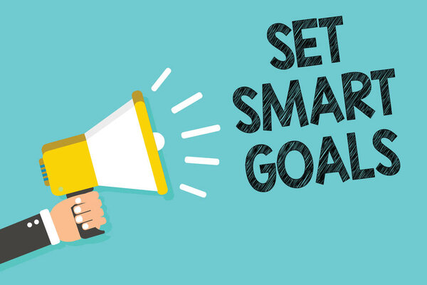 Writing note showing Set Smart Goals. Business photo showcasing Establish achievable objectives Make good business plans Man holding megaphone loudspeaker blue background message speaking
