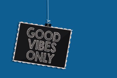 Writing note showing Good Vibes Only. Business photo showcasing Just positive emotions feelings No negative energies Hanging blackboard message communication information blue background clipart