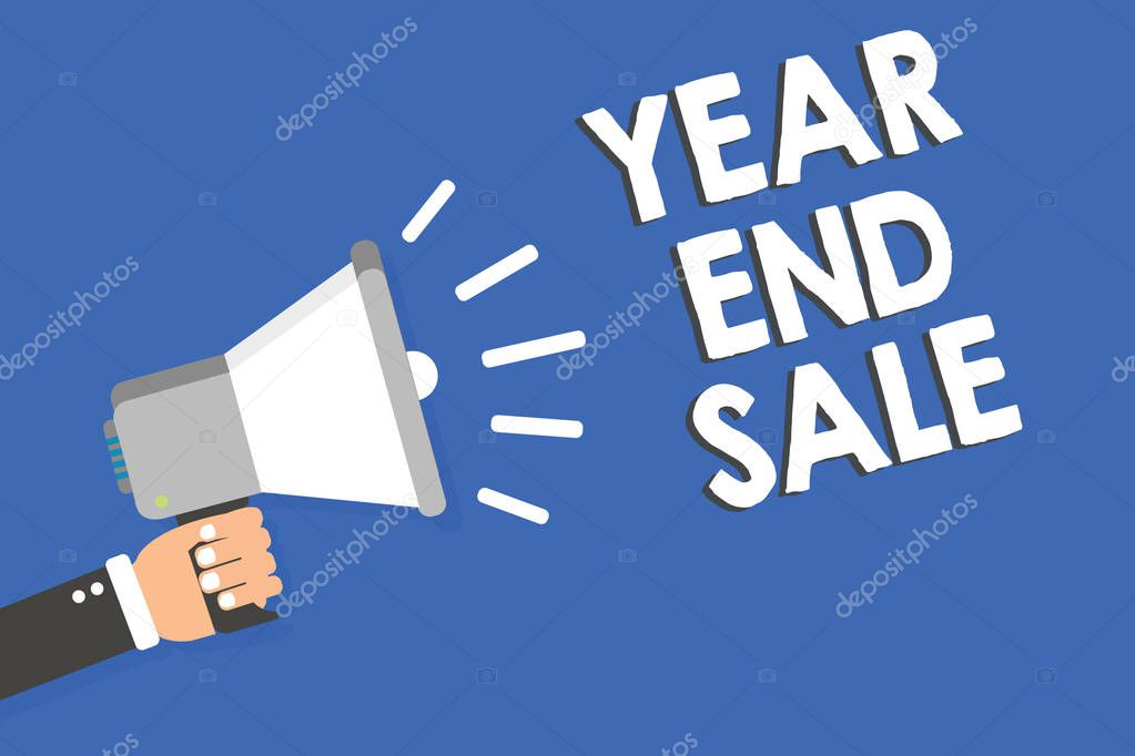Text sign showing Year And Sale. Conceptual photo Annual Discounts Holiday Season clearance Traditional Man holding megaphone loudspeaker blue background message speaking loud