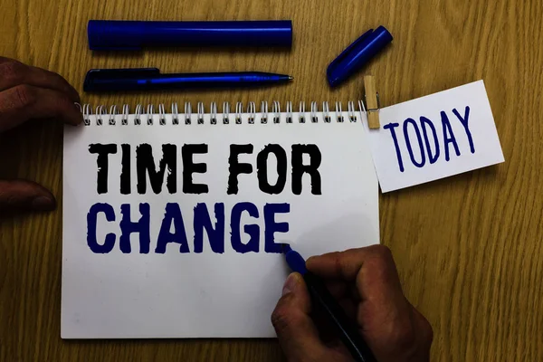 Handwriting text Time For Change. Concept meaning Changing Moment Evolution New Beginnings Chance to Grow Man holding marker notebook clothespin reminder wooden table cup coffee