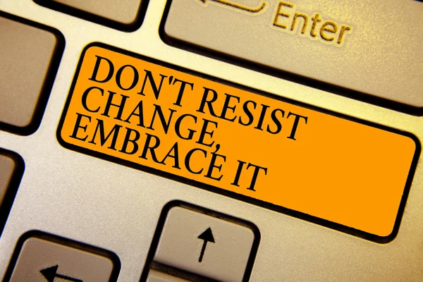 Text sign showing Don t not Resist Change, Embrace It.. Conceptual photo Be open to changes try new things positive Keyboard orange key Intention create computer computing reflection document