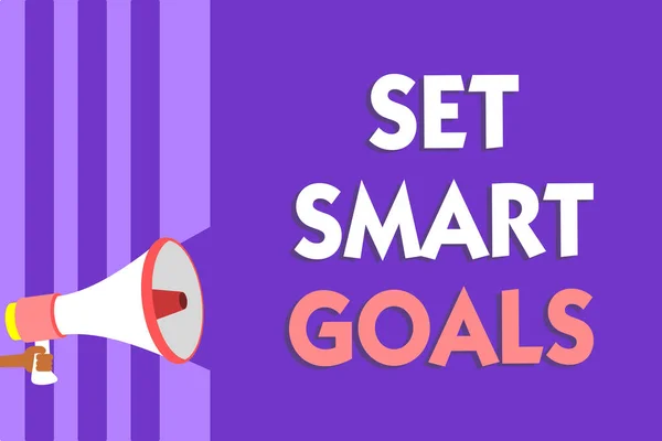 Conceptual hand writing showing Set Smart Goals. Business photo text Establish achievable objectives Make good business plans Megaphone loudspeaker purple stripes important message speaking