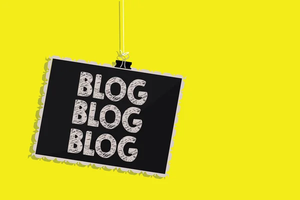 Writing note showing Blog Blog Blog. Business photo showcasing Internet blogging trend modern virtual communication Hanging blackboard message communication sign yellow background