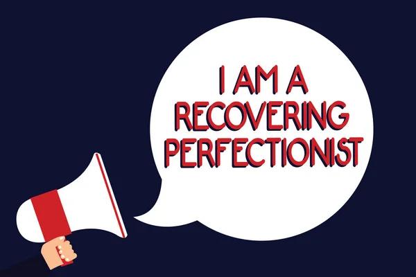 Writing note showing I Am A Recovering Perfectionist. Business photo showcasing Obsessive compulsive disorder recovery Man holding megaphone loudspeaker speech bubble black background