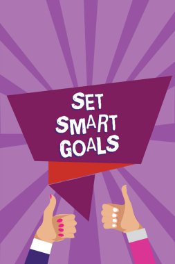 Word writing text Set Smart Goals. Business concept for Establish achievable objectives Make good business plans Man woman hands thumbs up approval speech bubble origami rays background clipart