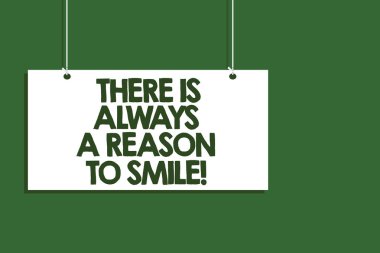 Orada olduğunu her zaman bir sebep için Smile A gösterilen Not yazma. Pozitif düşünme iyi tutum enerji asılı kurulu mesaj iletişim açık yakın işaret yeşil arka plan vitrine iş fotoğraf