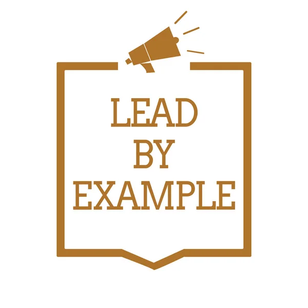 Text sign showing Lead By Example. Conceptual photo Be a mentor leader follow the rules give examples Coach Megaphone loudspeaker brown frame communicating important information