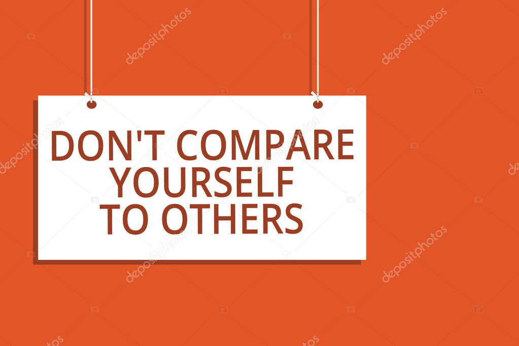 Word writing text Don t not Compare Yourself To Others. Business concept for Be your own version unique original Hanging board message communication open close sign orange background