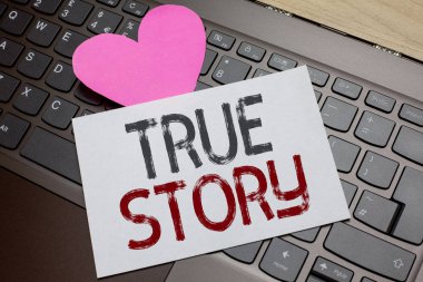 Word writing text True Story. Business concept for The day to day experiences of an individual in his entire life Paper Romantic lovely message Heart Keyboard Type computer Good feelings clipart