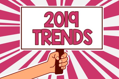 Word metin yazma, 2019 eğilimleri. Arka plan afiş önemli protesto mesajı pembe ışınları tutarak geçerli yıl adam elinde kısa süre için ünlü iş kavramı şeyler için