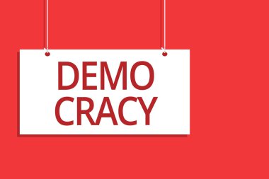 Word metin yazma Demo Cracy. İş kavramı insanların özgürlüğü kendi duygu ve inançları asılı kurulu mesaj iletişim yakın işaret turuncu arka plan açık ifade etmek için