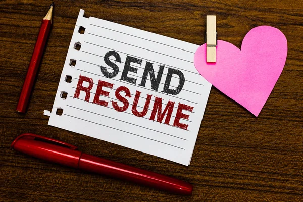 Word writing text Send Resume. Business concept for brief account persons education qualifications and occupations Notebook piece paper markers clothespin holding heart wooden background