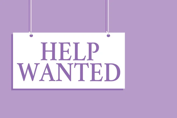 Writing note showing Help Wanted. Business photo showcasing advertisement placed in newspaper by employers seek employees Hanging board message communication open close sign purple background