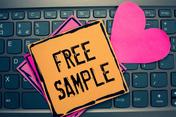 Writing note showing Free Sample. Business photo showcasing portion of products given to consumers in shopping malls Papers Romantic lovely message Heart Keyboard computer Good feelings
