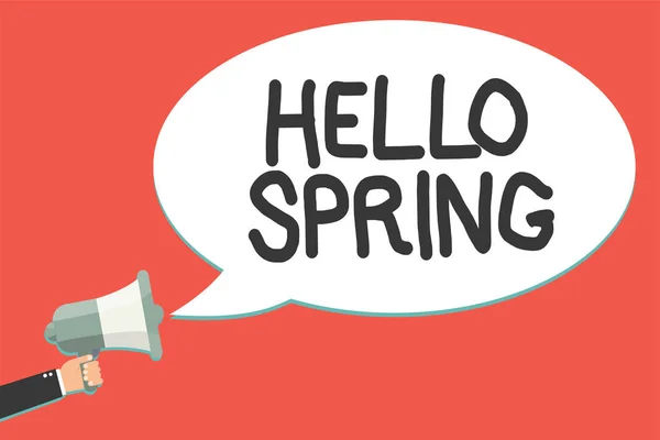 Text sign showing Hello Spring. Conceptual photo Welcoming the season after the winter Blossoming of flowers Man holding megaphone loudspeaker speech bubble message speaking loud. — Stock Photo, Image