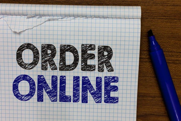 Word writing text Order Online. Business concept for Buying goods and services from the sellers over the internet Marker besides notebook crumpled papers ripped pages several tries mistakes.