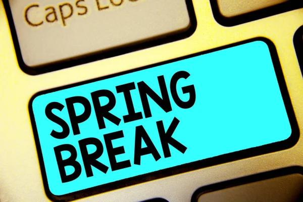 Writing note showing Spring Break. Business photo showcasing Vacation period at school and universities during spring Keyboard blue key Intention computer computing reflection document.