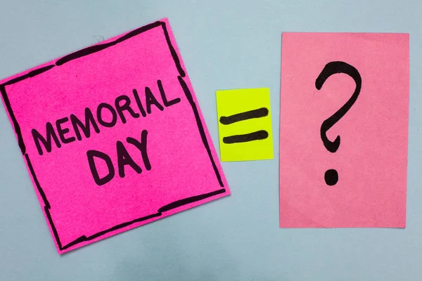 Word writing text Memorial Day. Business concept for To honor and remembering those who died in military service Pink paper notes reminders equal sign question mark important answer.