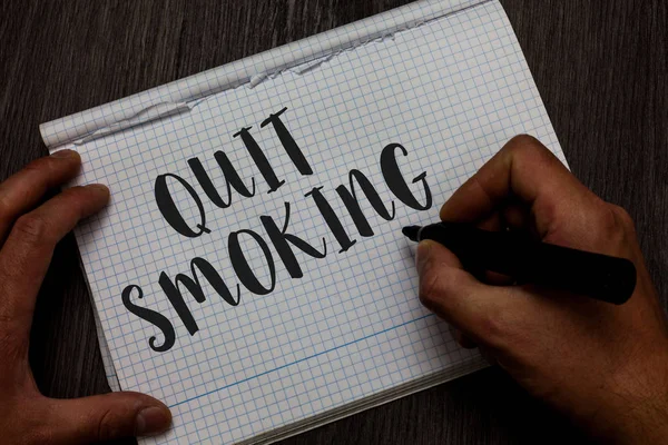 Writing note showing Quit Smoking. Business photo showcasing Discontinuing or stopping the use of tobacco addiction Man hand holding marker communicating ideas reflections squared paper. — Stock Photo, Image