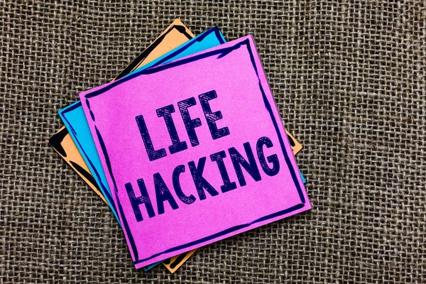 Handwriting text Life Hacking. Concept meaning Simple and clever techniques in accomplishing task easily Paper notes Important reminders Communicate ideas messages Jute background.