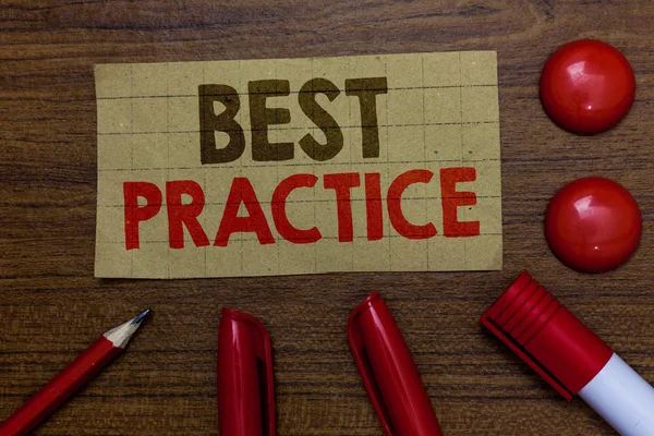 Handwriting text writing Best Practice. Concept meaning Method Systematic Touchstone Guidelines Framework Ethic Paperboard markers pencil wooden background communicating ideas red balls.