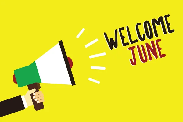 Text sign showing Welcome June. Conceptual photo Calendar Sixth Month Second Quarter Thirty days Greetings Man holding megaphone loudspeaker yellow background message speaking loud. — Stock Photo, Image
